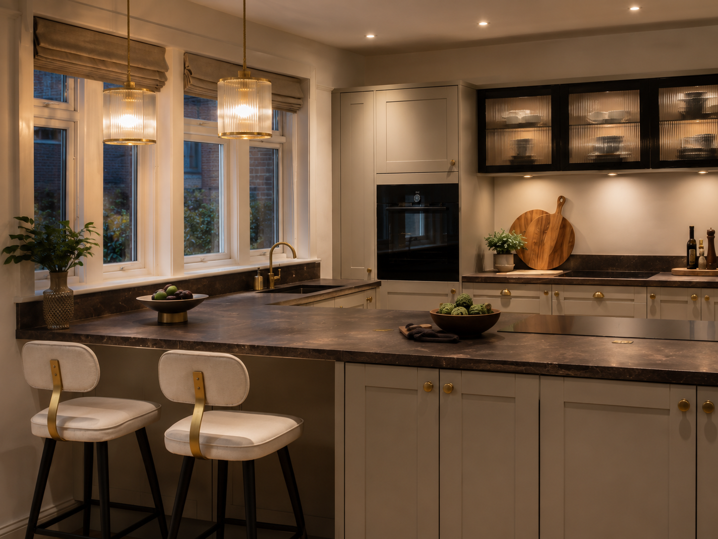 Warm-toned bespoke kitchen London with dark stone worktops and brass pendants — Dominus Kitchens — Evening Warm — Dominus Kitchens Bespoke Kitchens London | Dominus Kitchens London