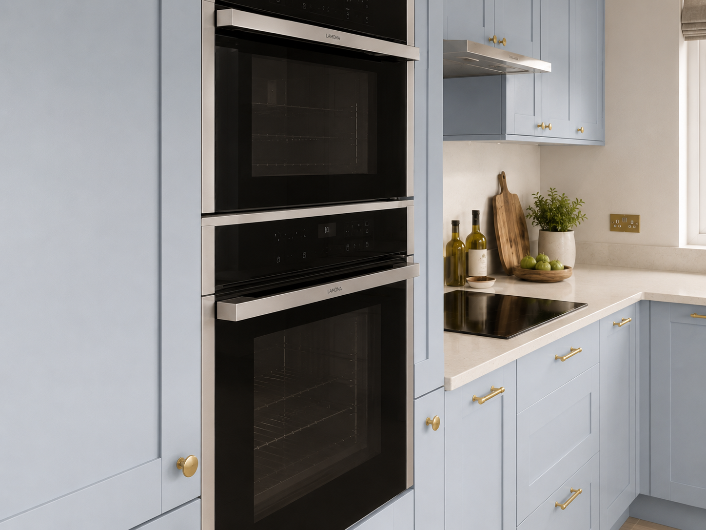 Powder blue and brass tap detail in a bespoke kitchen — Dominus Kitchens